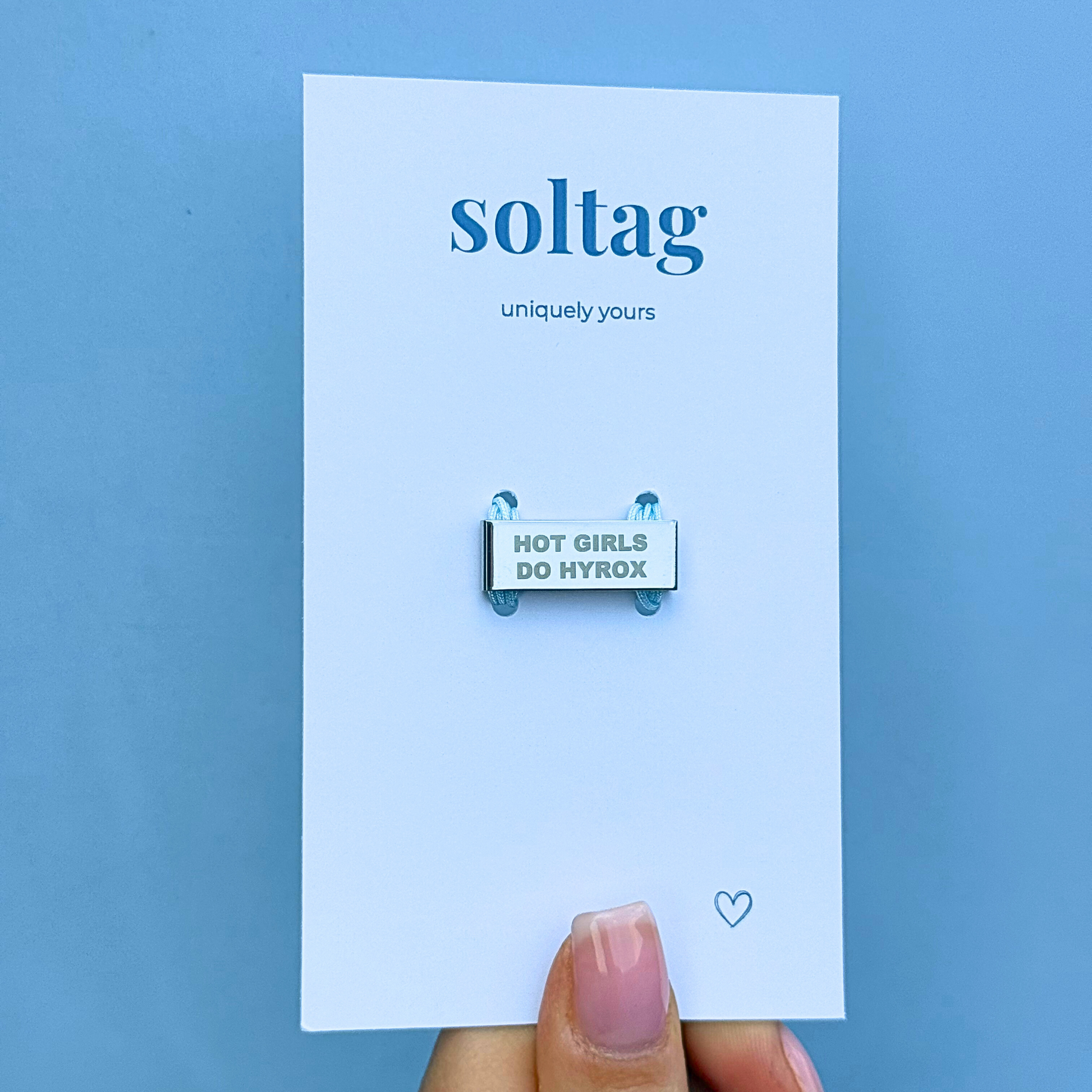 Hot girls do Hyrox’ engraved watch tag on Soltag packaging – perfect gift for Hyrox athletes